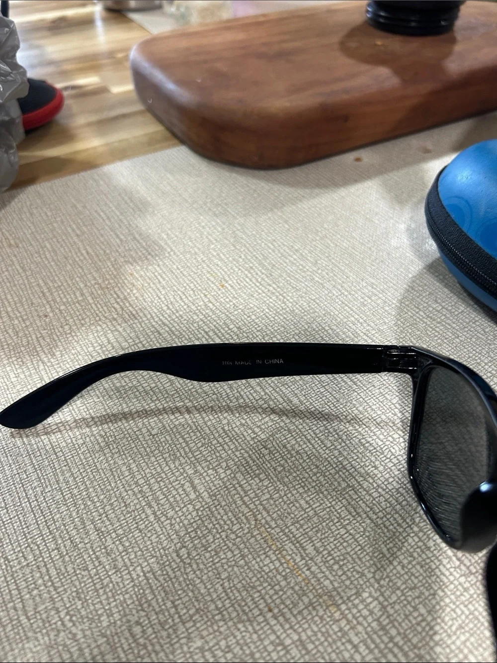 Ray-Ban Black Frame Sunglasses with Blue-Purple Mirrored Lenses